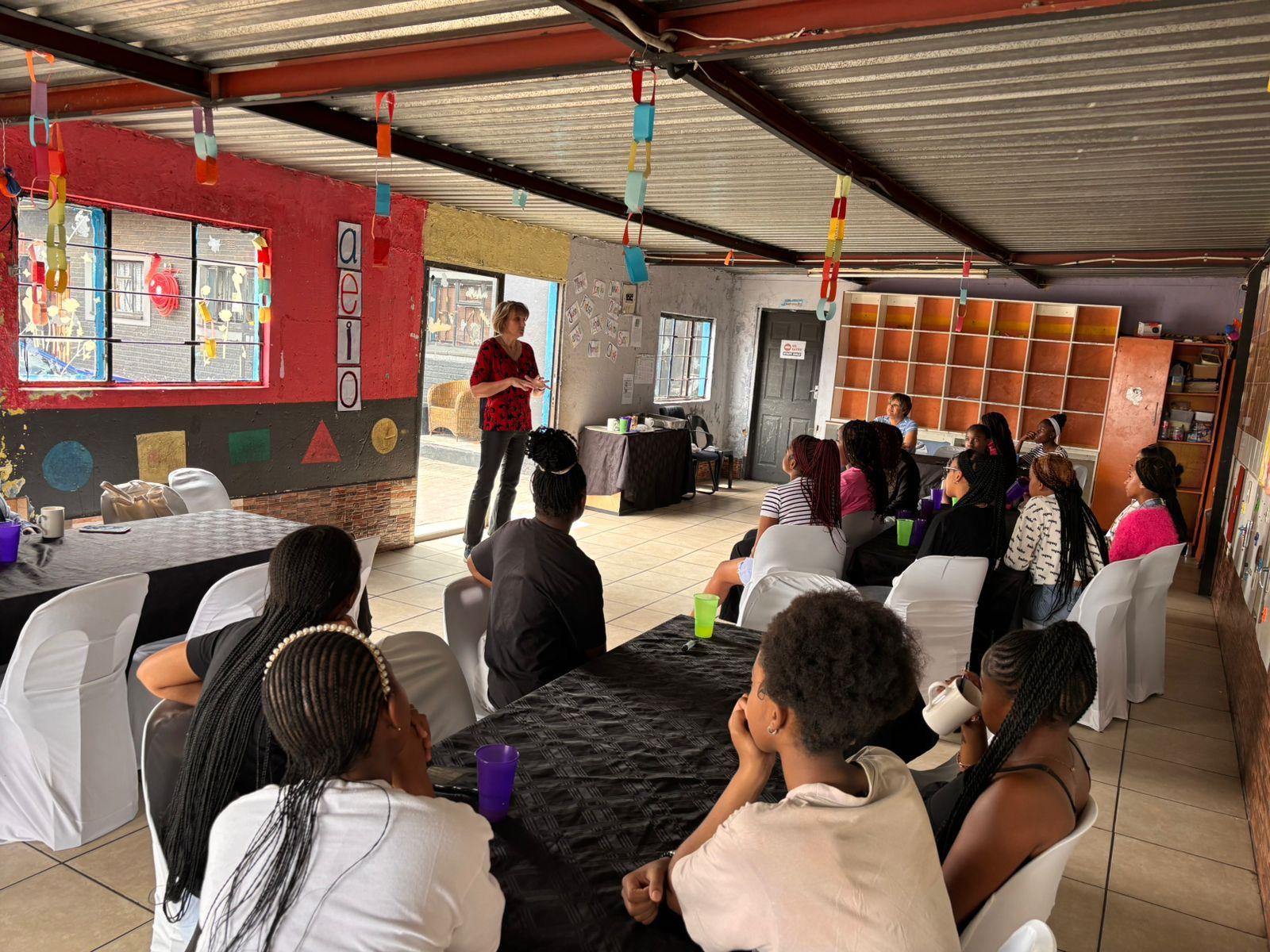 Diverse corporate professionals and community members collaborating globally